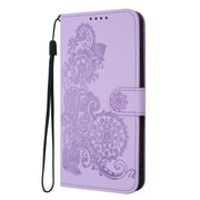 For Google Pixel 9 Datura Flower Embossed Flip Leather Phone Case(Purple)