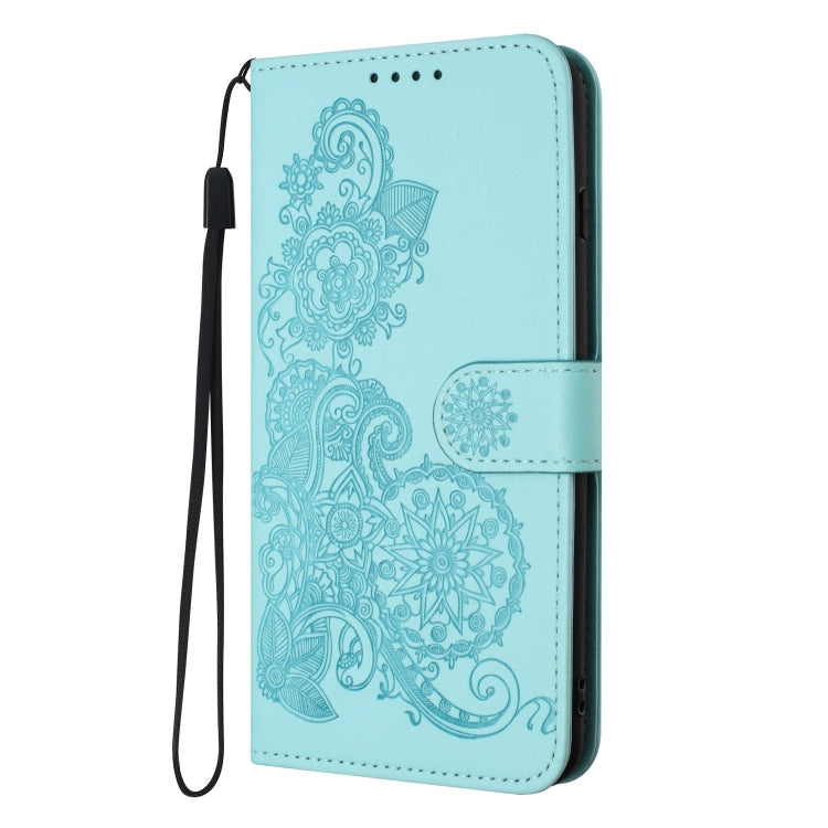 For Xiaomi Redmi K70 Datura Flower Embossed Flip Leather Phone Case(Light blue)