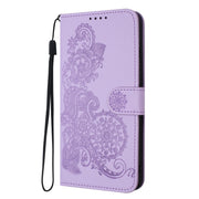 For Xiaomi Redmi K70 Datura Flower Embossed Flip Leather Phone Case(Purple)