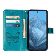 For Google Pixel 9 Embossed Butterfly Leather Phone Case(Blue)