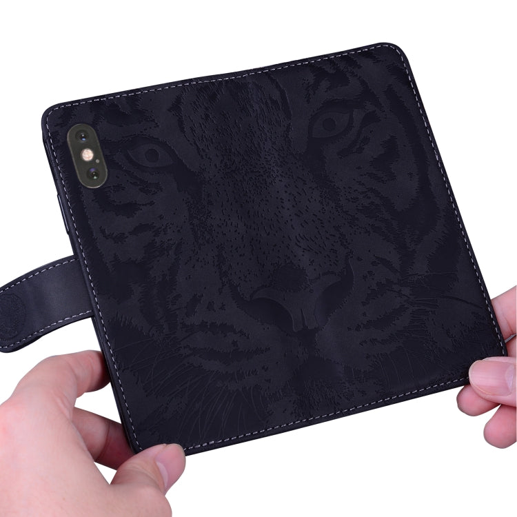For Google Pixel 9 Tiger Embossing Pattern Flip Leather Phone Case(Black)