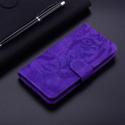 For Google Pixel 9 Tiger Embossing Pattern Flip Leather Phone Case(Purple)
