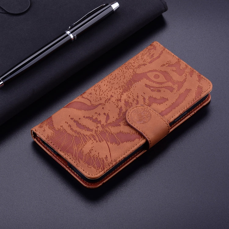 For Google Pixel 9 Tiger Embossing Pattern Flip Leather Phone Case(Brown)