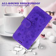 For Google Pixel 9 Pro Butterfly Rose Embossed Leather Phone Case(Purple)