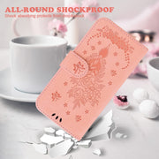For Google Pixel 9 Pro Butterfly Rose Embossed Leather Phone Case(Pink)