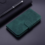For Google Pixel 9 Skin Feel Pure Color Flip Leather Phone Case(Green)
