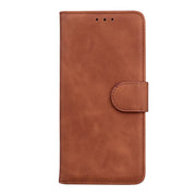 For Google Pixel 9 Skin Feel Pure Color Flip Leather Phone Case(Brown)