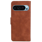 For Google Pixel 9 Skin Feel Pure Color Flip Leather Phone Case(Brown)