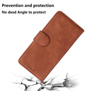For Google Pixel 9 Skin Feel Pure Color Flip Leather Phone Case(Brown)