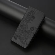 For iPhone 16e Datura Flower Embossed Flip Leather Phone Case(Black)