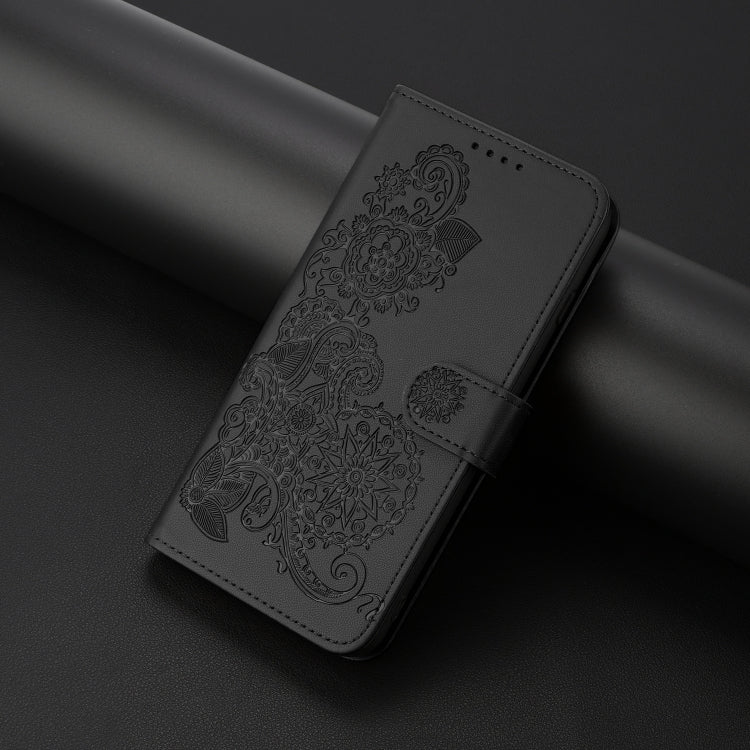 For iPhone 16e Datura Flower Embossed Flip Leather Phone Case(Black)