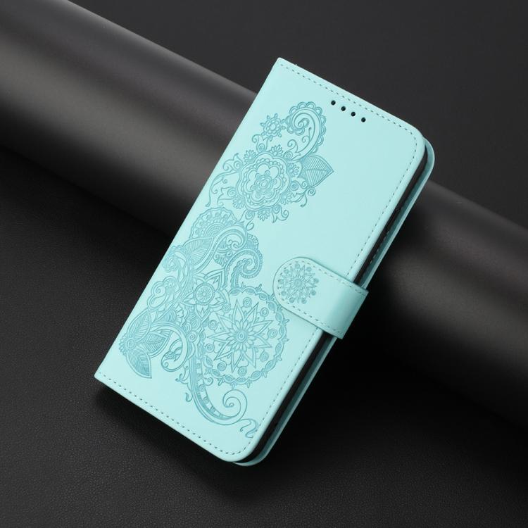 For iPhone 17 Datura Flower Embossed Flip Leather Phone Case(Light Blue)