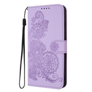 For iPhone 17 Datura Flower Embossed Flip Leather Phone Case(Purple)