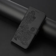 For iPhone 17 Pro Max Datura Flower Embossed Flip Leather Phone Case(Black)