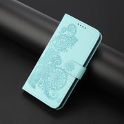 For iPhone 17 Pro Datura Flower Embossed Flip Leather Phone Case(Light Blue)