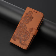 For iPhone 17 Pro Datura Flower Embossed Flip Leather Phone Case(Brown)