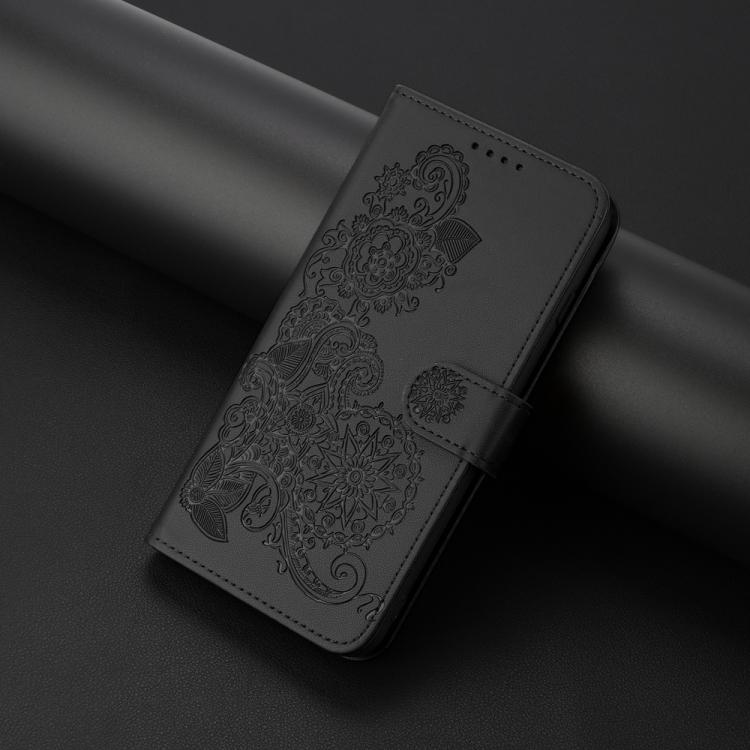 For iPhone 17 Pro Datura Flower Embossed Flip Leather Phone Case(Black)