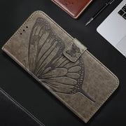 For Realme C67 5G India/Narzo 60x Global Embossed Butterfly Leather Phone Case(Grey)