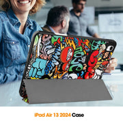 For iPad Air 13 2024 Custer Painted 3-Fold Holder Smart Leather Tablet Case with Pen Tray(Graffiti)