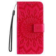 For iPhone 16 Embossed Sunflower Pattern Flip Leather Phone Case(Red)
