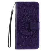 For iPhone 16 Pro Max Embossed Sunflower Pattern Flip Leather Phone Case(Purple)