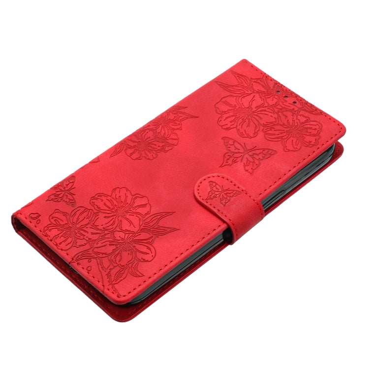 For iPhone 16 Plus Cherry Blossom Butterfly Skin Feel Embossed PU Phone Case(Red)