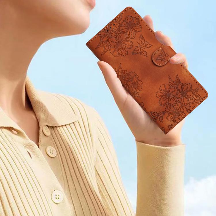 For iPhone 16e Cherry Blossom Butterfly Skin Feel Embossed PU Phone Case(Brown)