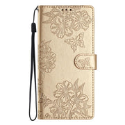 For iPhone 16e Cherry Blossom Butterfly Skin Feel Embossed PU Phone Case(Gold)