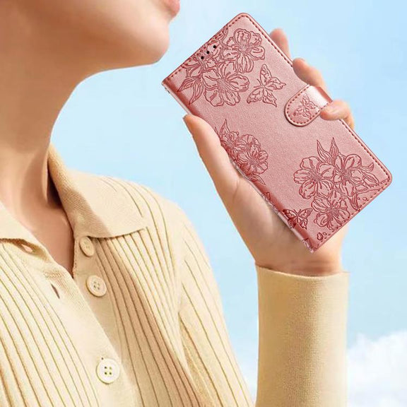 For iPhone 16e Cherry Blossom Butterfly Skin Feel Embossed PU Phone Case(Rose Gold)