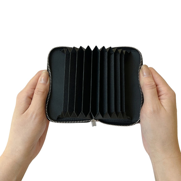 For iPhone 16 Plus Solid Color Zipper 11-Card Slots Bag Phone Case with Lanyard(Black)