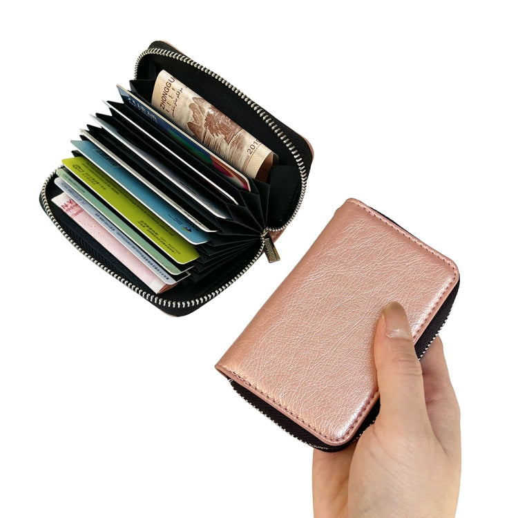 For iPhone 16 Plus Solid Color Zipper 11-Card Slots Bag Phone Case with Lanyard(Rose Gold)