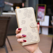 For Samsung Galaxy S25 Ultra 5G Four-leaf Embossed Leather Phone Case(Gold)