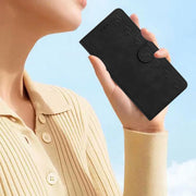 For Samsung Galaxy S25 5G Seven Butterflies Embossed Leather Phone Case(Black)