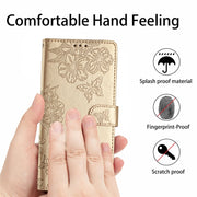 For Samsung Galaxy S25+ 5G Cherry Blossom Butterfly Skin Feel Embossed PU Phone Case(Gold)