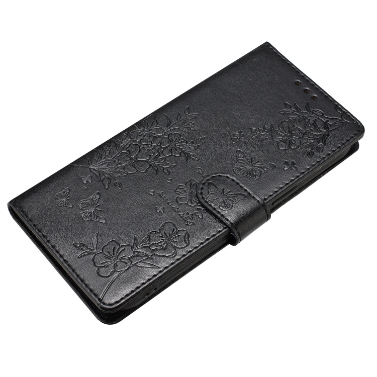 For iPhone 16 Butterflies and Flowers Leather Phone Case(Black)