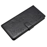 For iPhone 16 Butterflies and Flowers Leather Phone Case(Black)