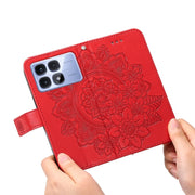 For Redmi K70 Ultra Seven-petal Flowers Embossing Leather Phone Case(Red)