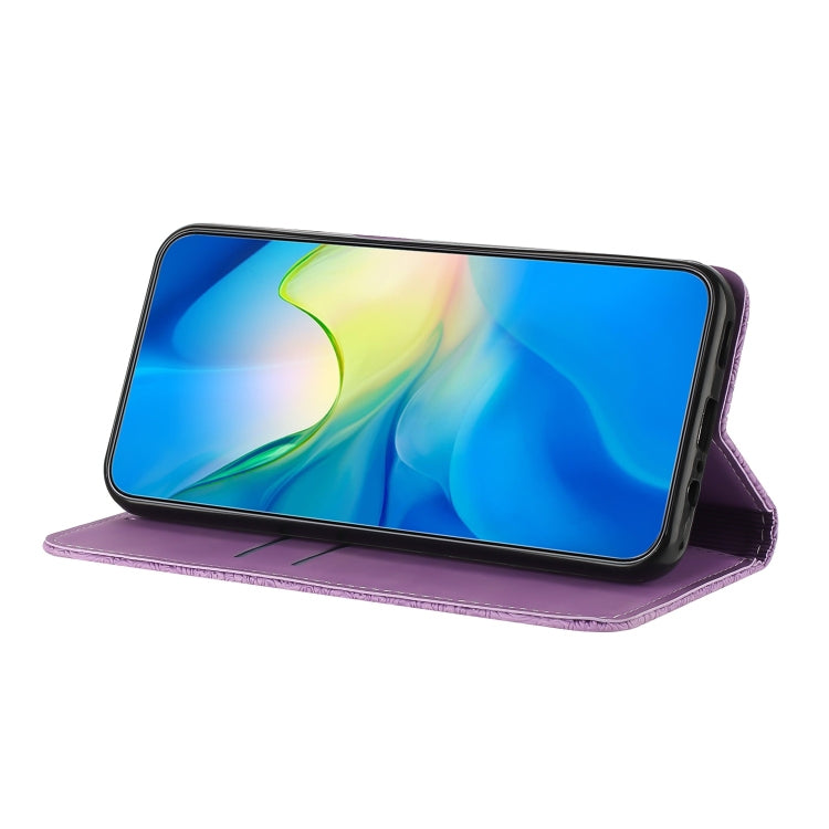 For Google Pixel 9 / 9 Pro Ethnic Embossed Adsorption Leather Phone Case(Purple)