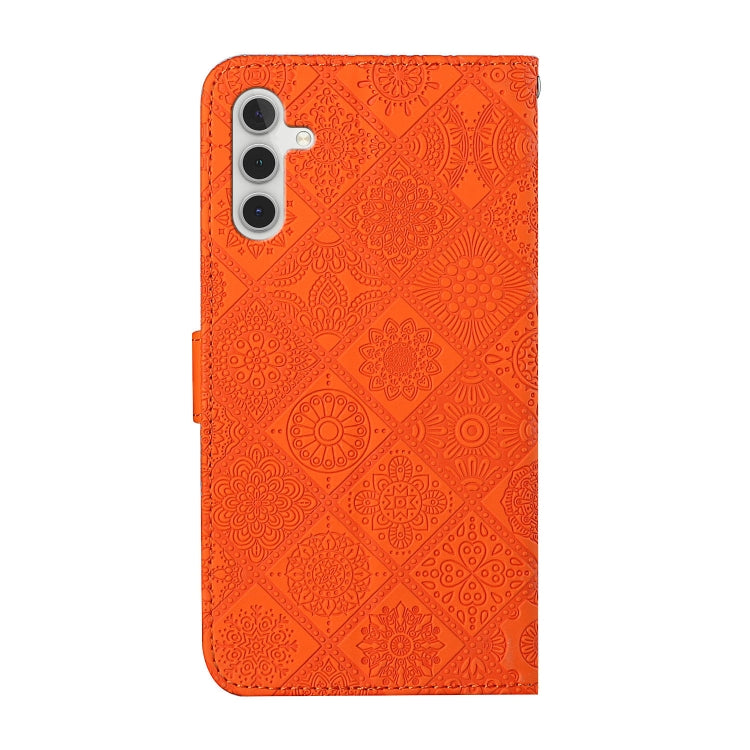For Samsung Galaxy S25+ 5G Ethnic Style Embossed Pattern Leather Phone Case(Orange)