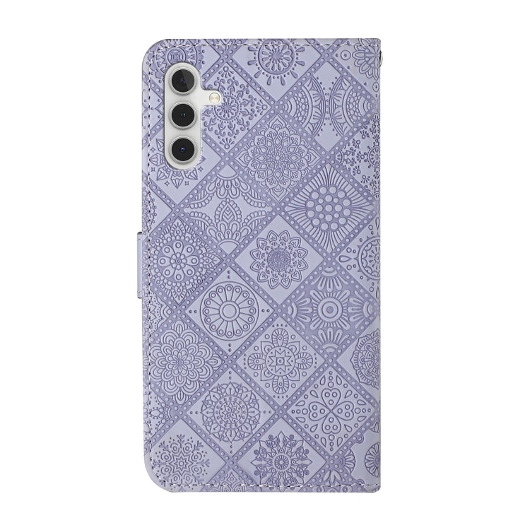 For Samsung Galaxy S25+ 5G Ethnic Style Embossed Pattern Leather Phone Case(Purple)