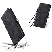 For iPhone 16e Skin Feel Totem Embossed Leather Phone Case(Black)