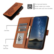 For Samsung Galaxy S25+ 5G Datura Flower Embossed Flip Leather Phone Case(Brown)