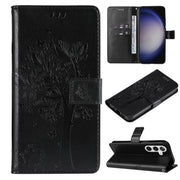 For Samsung Galaxy S25+ / S24+ 5G Tree & Cat Embossed Pattern Flip Leather Phone Case(Black)
