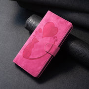 For Samsung Galaxy S25+ 5G Pen Heart Cat Embossed Leather Phone Case(Pink)