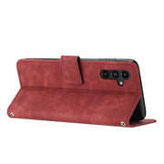 For Samsung Galaxy S25 / S24 5G Skin Feel Stripe Pattern Leather Phone Case with Long Lanyard(Red)