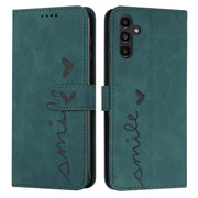 For Samsung Galaxy S25 / S24 5G Skin Feel Heart Embossed Leather Phone Case with Long Lanyard(Green)