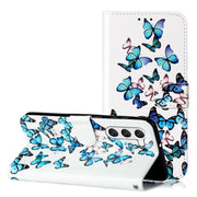 For Samsung Galaxy S25 5G Colored Drawing Marble Pattern Leather Phone Case(Little Blue Butterflies)