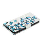 For Samsung Galaxy S25+ 5G Colored Drawing Marble Pattern Leather Phone Case(Little Blue Butterflies)