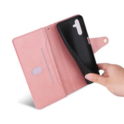 For Samsung Galaxy S25 5G Rivet Buckle 9 Cards Three Fold Leather Phone Case(Rose Gold)