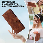 For Samsung Galaxy S25+ 5G Lace Floral Embossed Magnetic Buckle PU Phone Case With Wrist Strap(Brown)